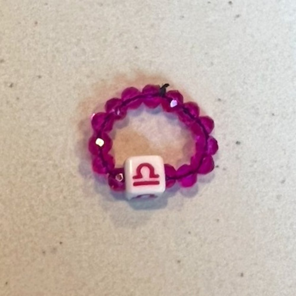 "LIBRA" HOROSCOPE MAGENTA CRYSTAL BEADED RING (ONE SIZE)